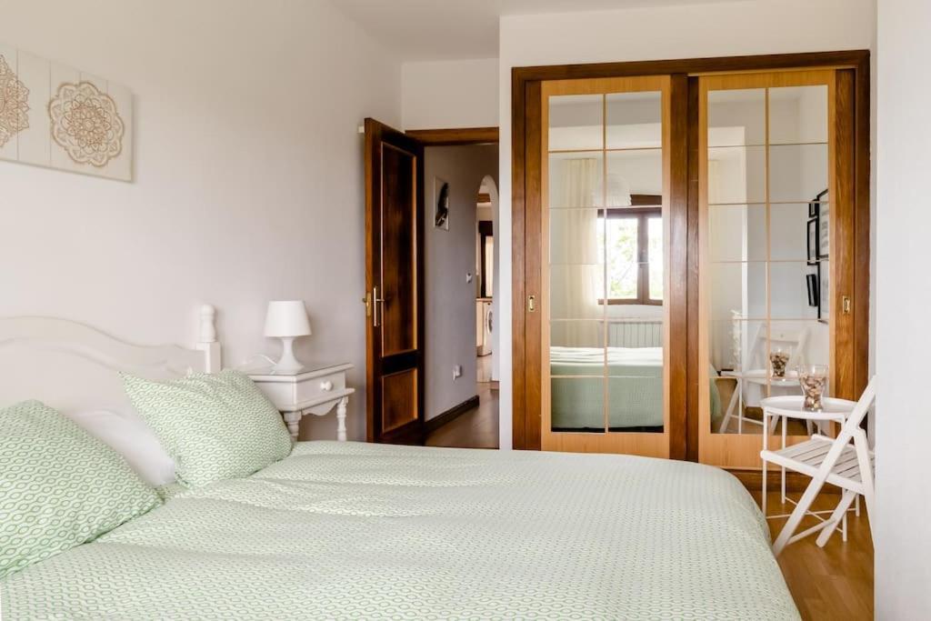 Casa de Las Flores - Apartamento con jardín privado frente a la Playa de Comillas Exterior foto